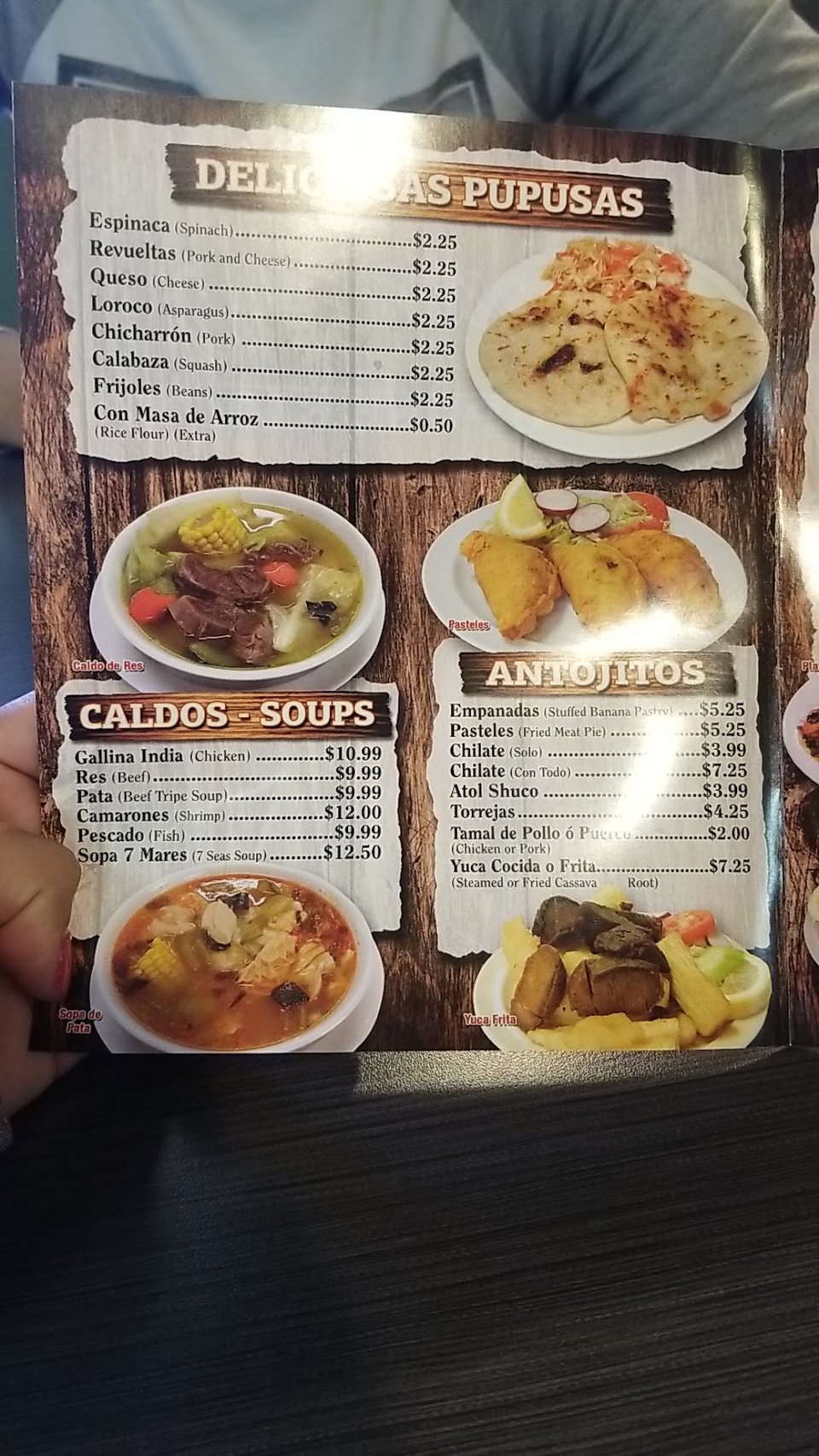 Printed menu featuring Salvadoran specialties.